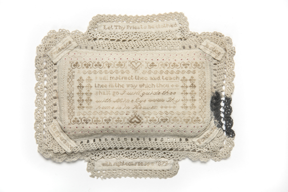 A curious pin-cushion embroidered with human hair by Annie Parker, a woman who, in her tragically short life, was arrested over 400 times for alcohol-related offences (1879). © Museum of London / object courtesy the Metropolitan Police's Crime Museum