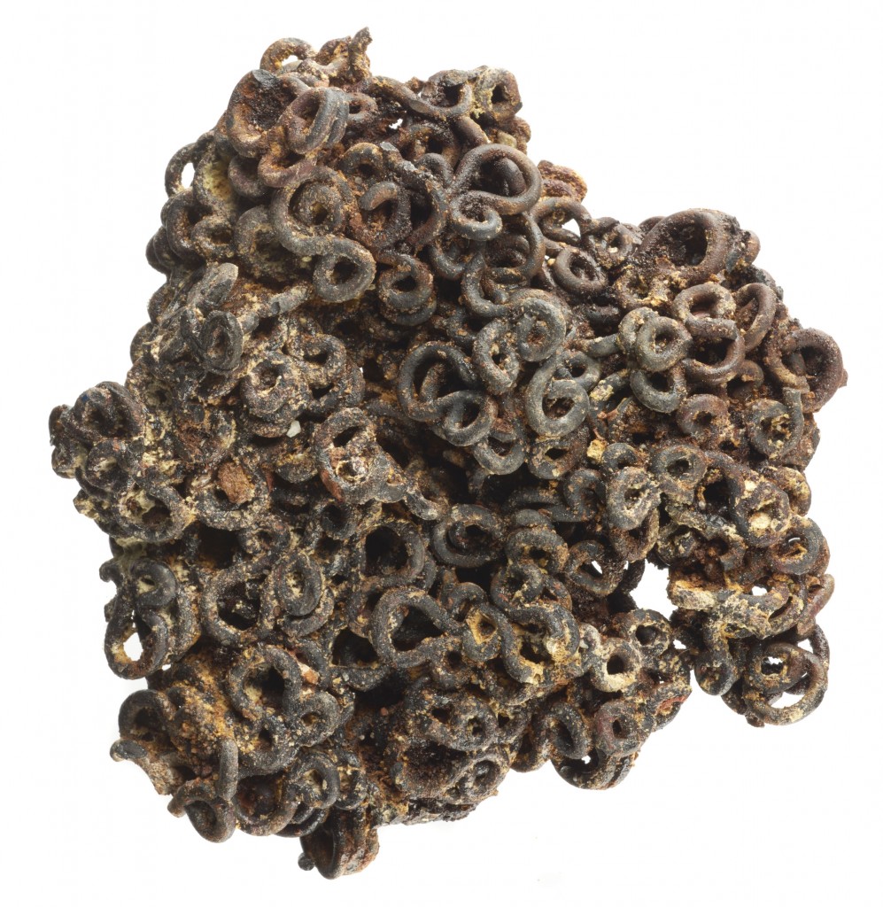 Fused lump of hooks and eyes Museum of London id PEN79[337]b This image may be used free of charge for the purpose of promoting or reviewing the Museum of London exhibition ‘Fire! Fire!’ 2016-2017. All other uses must be cleared with the Museum of London picture library.