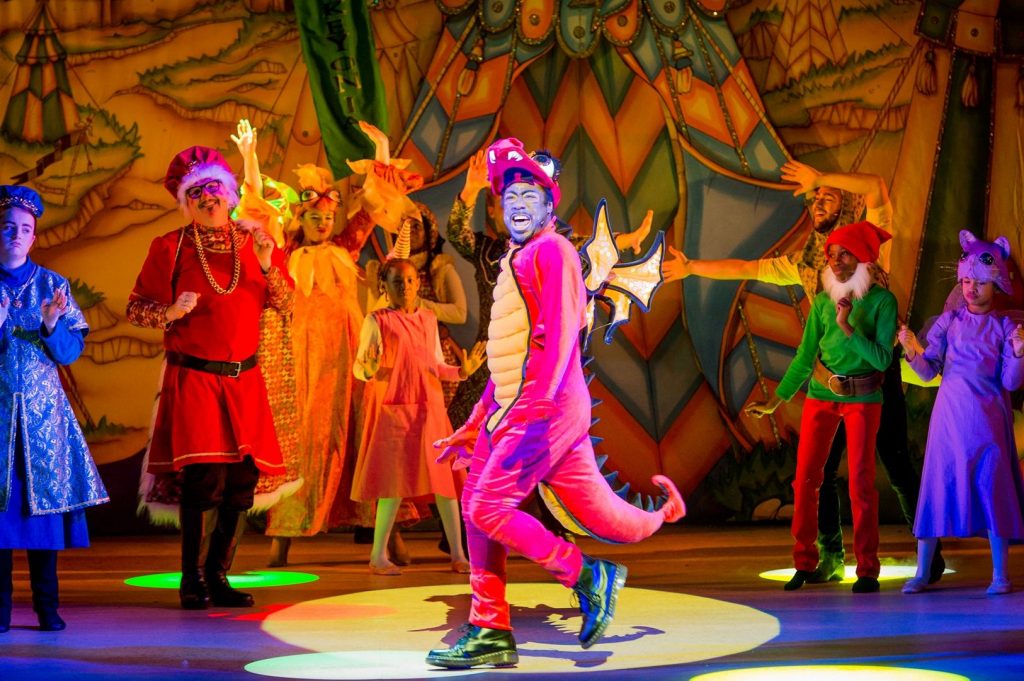 Kat B as Denzil the Dragon in Hackney Empire's Sleeping Beauty