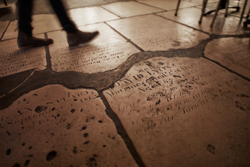 Café in the Crypt gravestone flooring